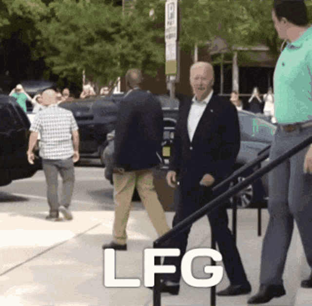 a man in a suit is walking down a sidewalk with the word lfg written on it