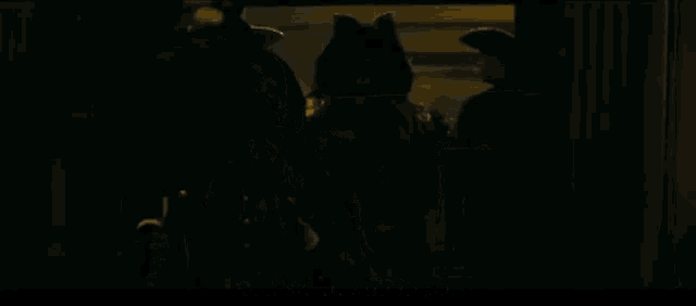a man with a beard and tentacles is standing in a dark room and says " like some mongrel "