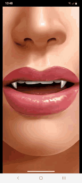 a close up of a woman 's mouth with vampire teeth and red lips