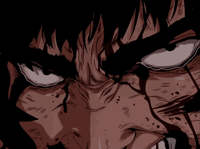 a close up of a man 's face with blood on it