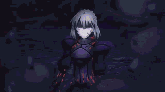 a close up of a person holding a sword in their hands .