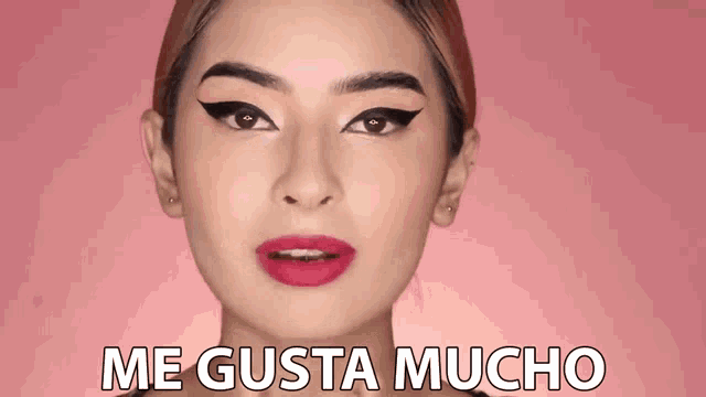 a woman says me gusta mucho in spanish
