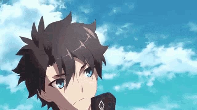 a close up of a person 's head with a blue sky in the background