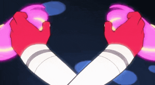 a couple of hands are making a heart shape with their fingers .