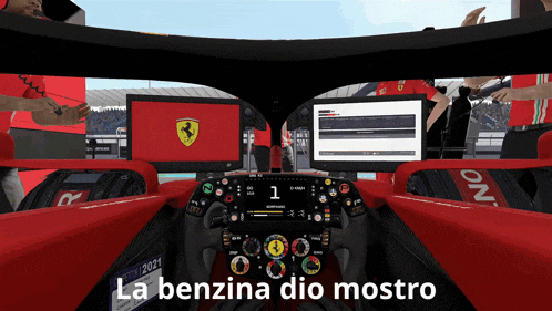 the inside of a ferrari race car with the words la benzina dio mostro on the bottom