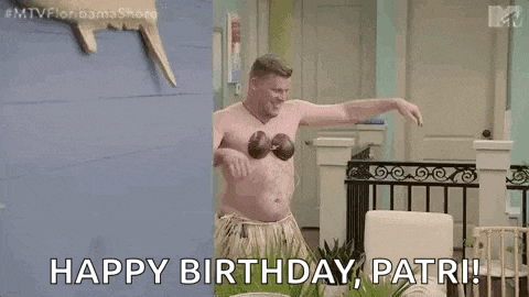 a shirtless man in a hula skirt is dancing in a living room with the words `` happy birthday patri '' .