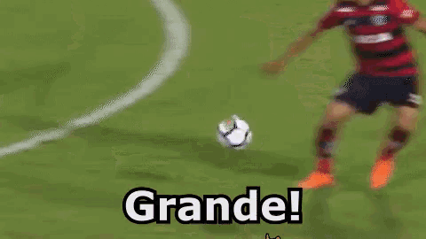 two soccer players are playing a game and one of them is wearing a shirt that says caixa on it .