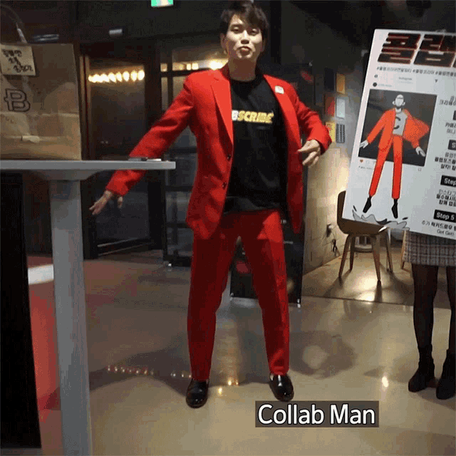 a man in a red suit with a black shirt that says bscrube