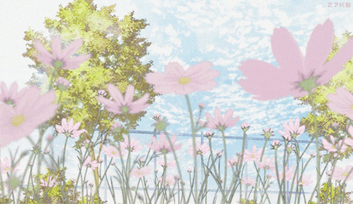 a bunch of pink flowers are growing in a field