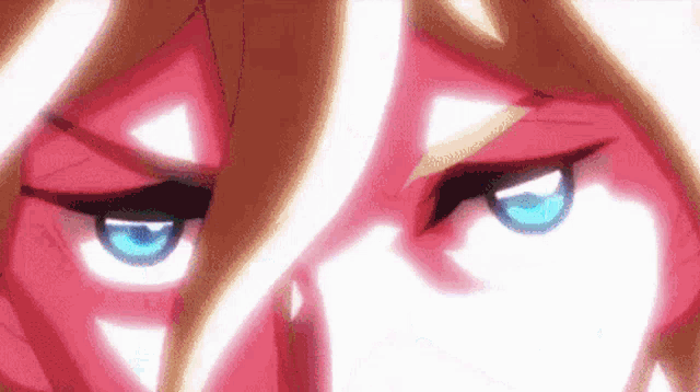 a close up of a person 's eyes with blue eyes and a red face .