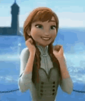 anna from frozen is smiling and adjusting her braids in front of the ocean