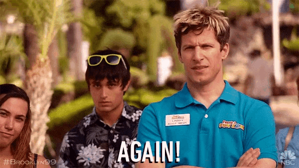 a man wearing a blue shirt that says again