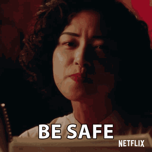 a woman with blood on her face says be safe