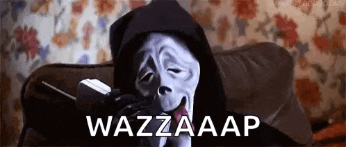 a grim reaper is sitting on a couch talking on a cell phone .