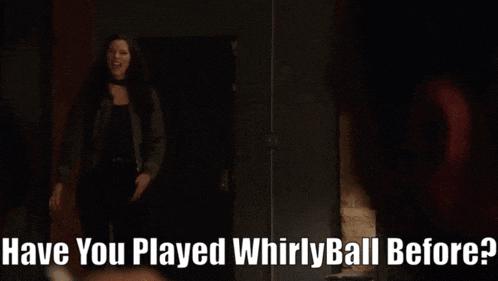 a woman standing in a dark room with the words " have you played whirlyball before " above her
