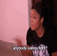 a woman is asking if anyone wanna fight