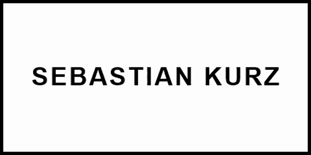 a sign that says ' krise nba usatz ' in black letters on a white background