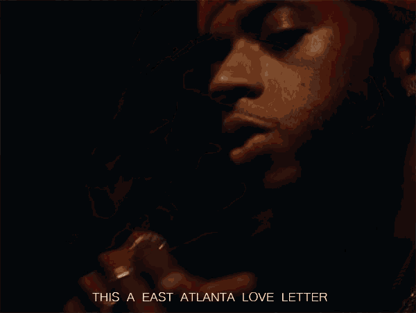 a close up of a man 's face with the words " this a east atlanta love letter " below him