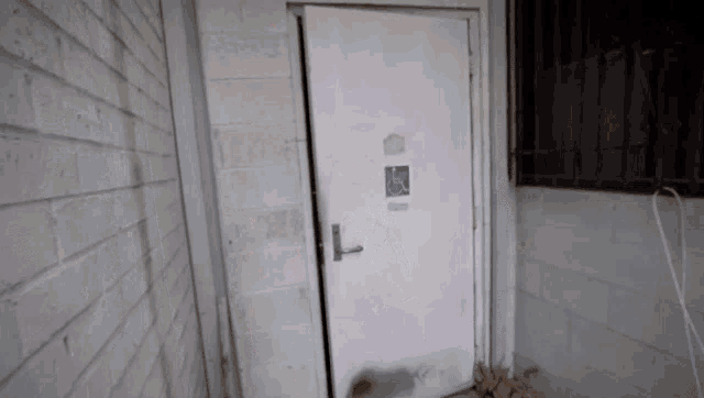 a white door with a sign on it that says handicap