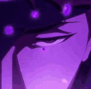 a close up of a person 's face with purple lights surrounding it and a purple background .