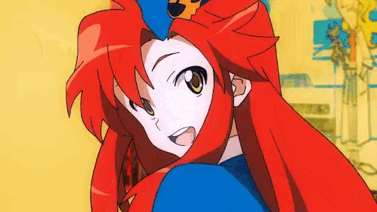 a cartoon girl with red hair and a blue hat