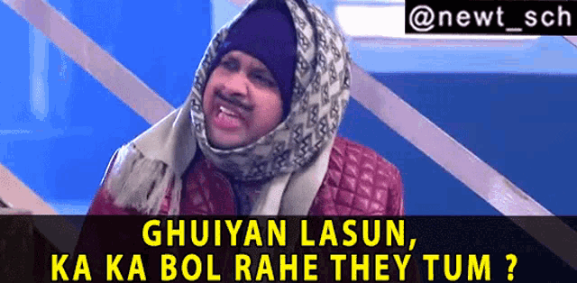a man wearing a scarf and a hat with the caption " ghuiyan lasun ka ka bol rahe they tum "
