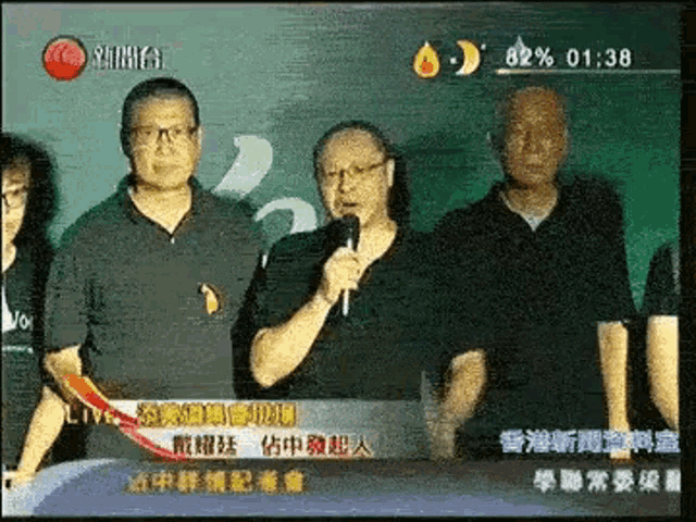 a group of men are standing in front of a screen that says sunrise