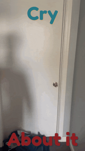 a white door with the words cry and about it written on it