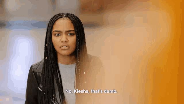 a woman with braids is saying no kiesha that 's dumb
