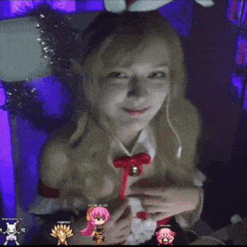 a girl is wearing a santa hat and dress