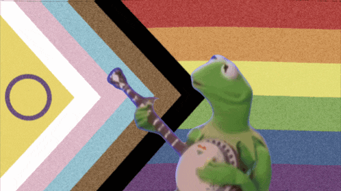 kermit the frog holding a banjo in front of a rainbow flag