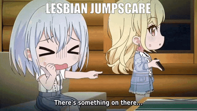 a cartoon of two girls with the caption lesbian jumpscare