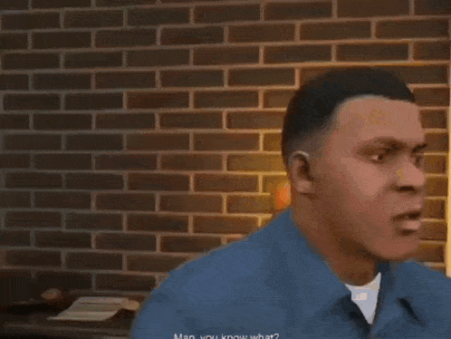 a man in a blue shirt is standing in front of a brick wall and says man you know what
