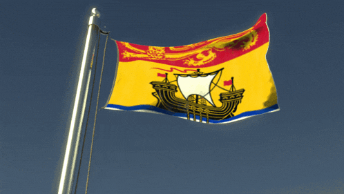 a yellow and red flag with a white ship on it