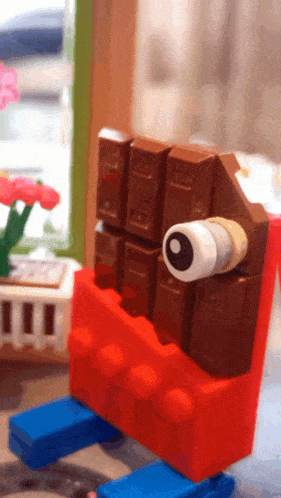 a lego creation of a monster made out of chocolate bars