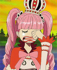 a cartoon girl with pink hair and a crown on her head is crying