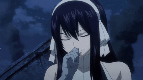 a girl with long black hair is covering her nose with her hand