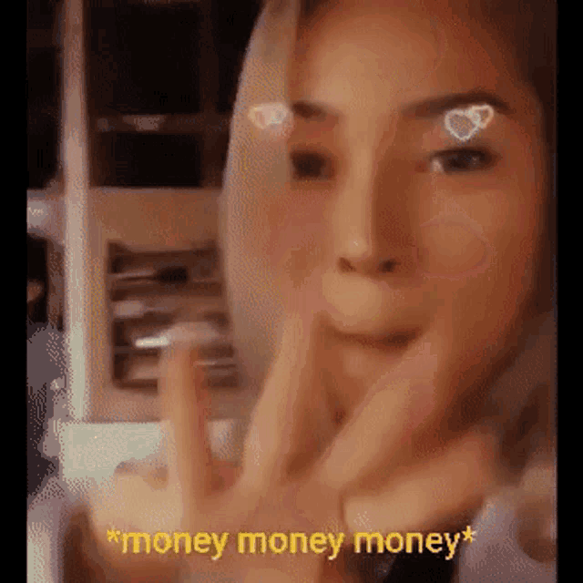 a close up of a woman 's face with the words " money money money " on the bottom