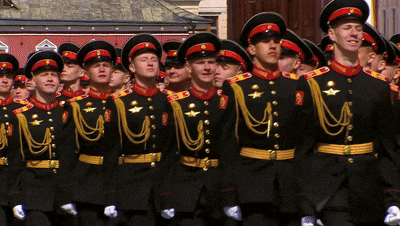 a group of men in military uniforms are lined up in a row