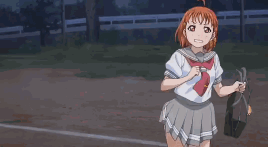 a girl in a school uniform is running on a dirt road