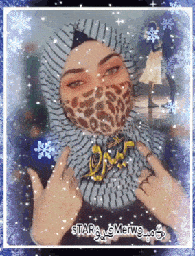 a picture of a woman wearing a leopard print scarf and a star merwo logo