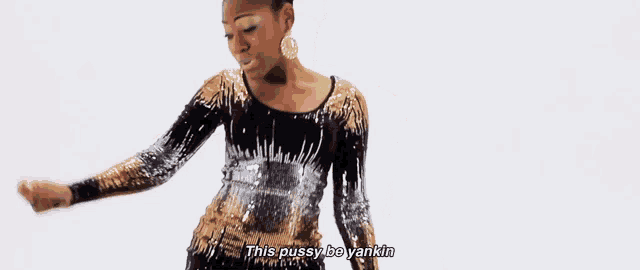 a woman in a sequined dress is surrounded by pink dice and says this pussy be yankin .