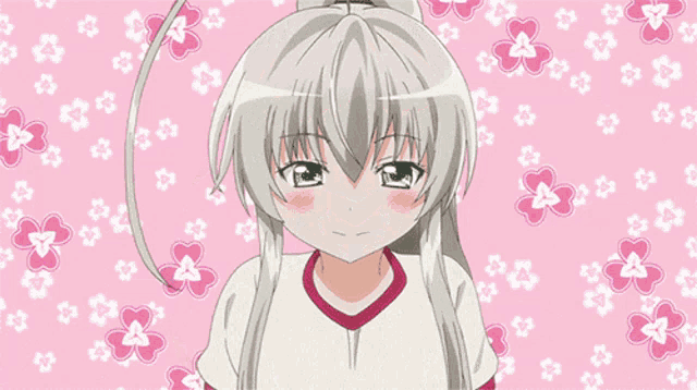 a girl in a white shirt with a red stripe on the sleeve