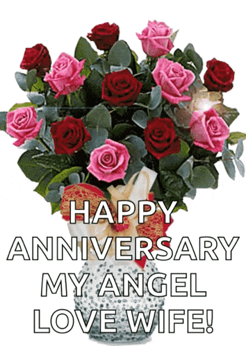 a bouquet of pink and red roses in a vase with the words happy anniversary my angel love wife