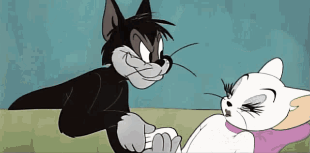 a cartoon cat is petting a white cat laying on a bed