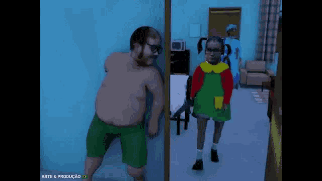a man in green shorts is kicking another man in a room