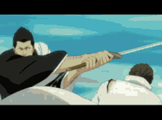 a man in a black cape is holding a sword