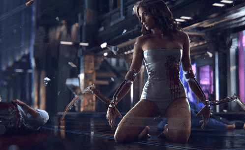 a woman with a robotic arm is kneeling down in a dark room