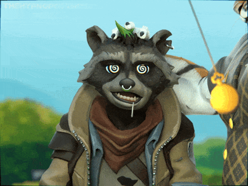 a raccoon with a hypnotic look on his face is being held by a man