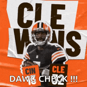 a cleveland browns football player holding a sign that says cin cle dawg check !!!